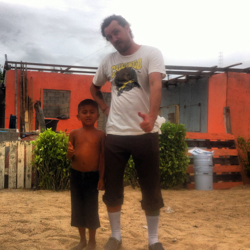 Volunteer and child during an earlier Offroad Xmas visit.