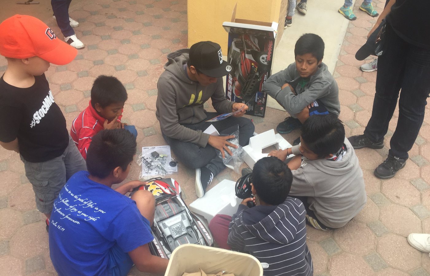 Kids gathered around as gifts are opened during Offroad Xmas.
